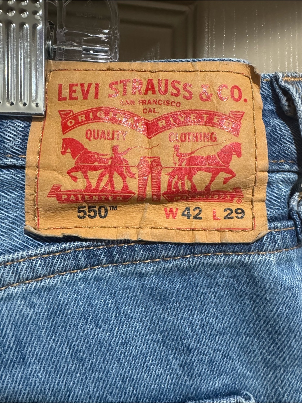 Levi's 550 Men's Relaxed Jeans - Light Blue Denim with Tan Patch